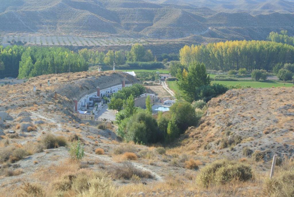 an aerial view of a road on a hill at Cuevas Al Sol in Castilléjar