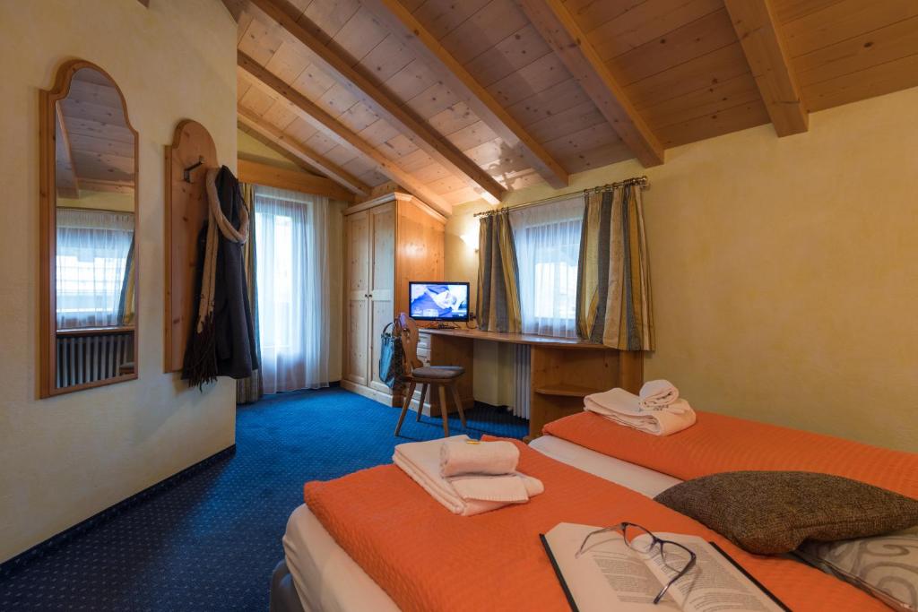 Postel nebo postele na pokoji v ubytování B&B Via Vai