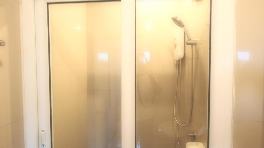 Koupelna v ubytování ibeyond Apartment Romklao Suvarnabhumi