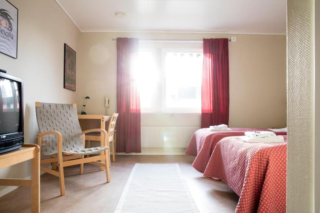 TV a/nebo společenská místnost v ubytování Nordiska Folkhögskolan Bed and Breakfast