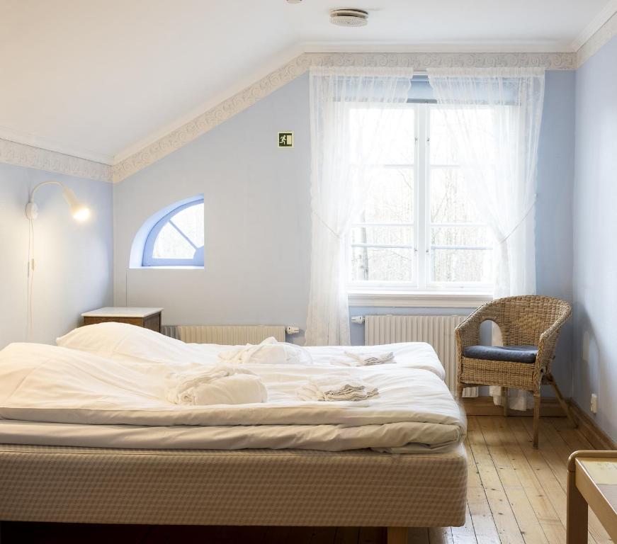 Postel nebo postele na pokoji v ubytování Nordiska Folkhögskolan Bed and Breakfast