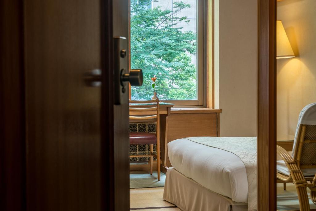Cama o camas de una habitación en Hilltop Hotel