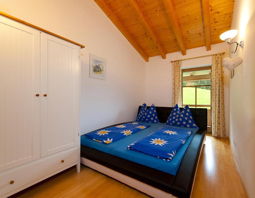 Postel nebo postele na pokoji v ubytování Ferienhaus Hochkönig