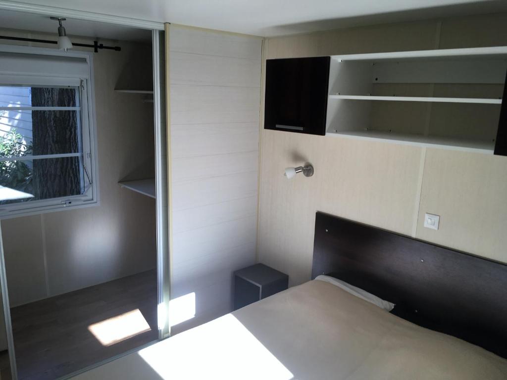 Postel nebo postele na pokoji v ubytování Rent Paradise