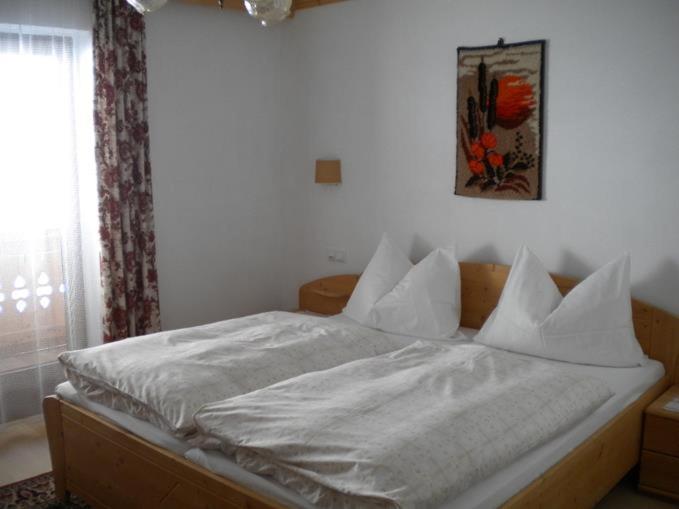 Postel nebo postele na pokoji v ubytování Weberhof