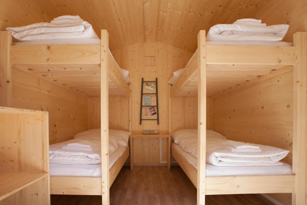 Postel nebo postele na pokoji v ubytování Life Camp
