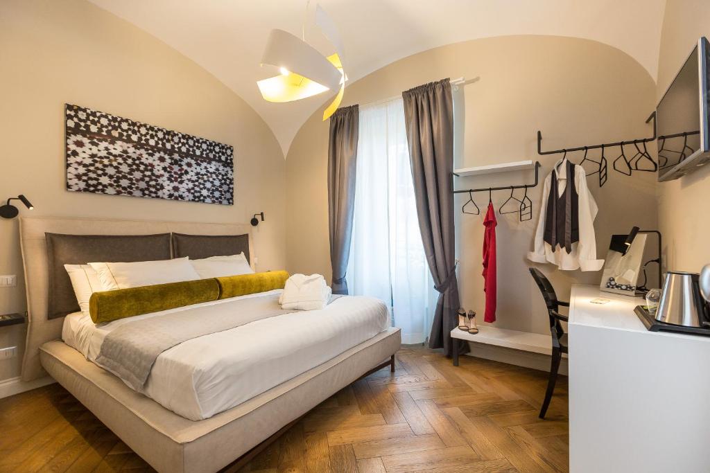 Posteľ alebo postele v izbe v ubytovaní Palazzo Baj in Trastevere