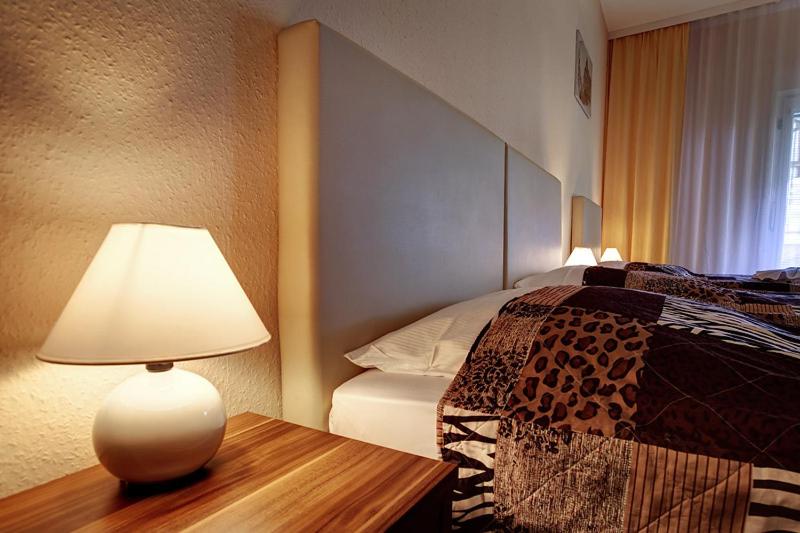 Postel nebo postele na pokoji v ubytování Hotel Kallmeyer