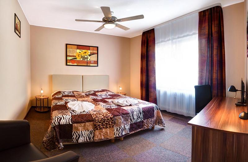 Postel nebo postele na pokoji v ubytování Hotel Kallmeyer