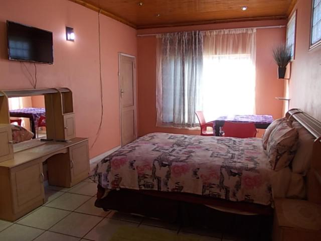 All Are Welcome Guest House - Family Room
