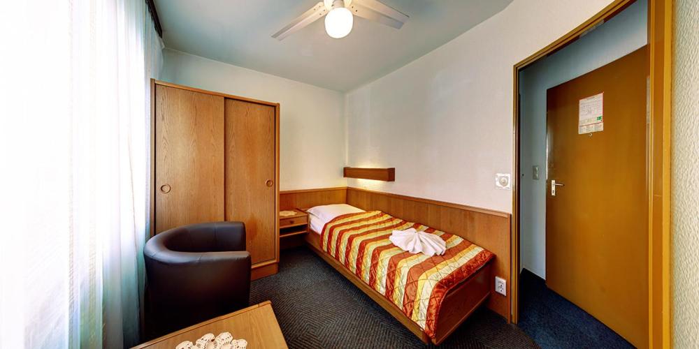 Postel nebo postele na pokoji v ubytování Hotel Kallmeyer