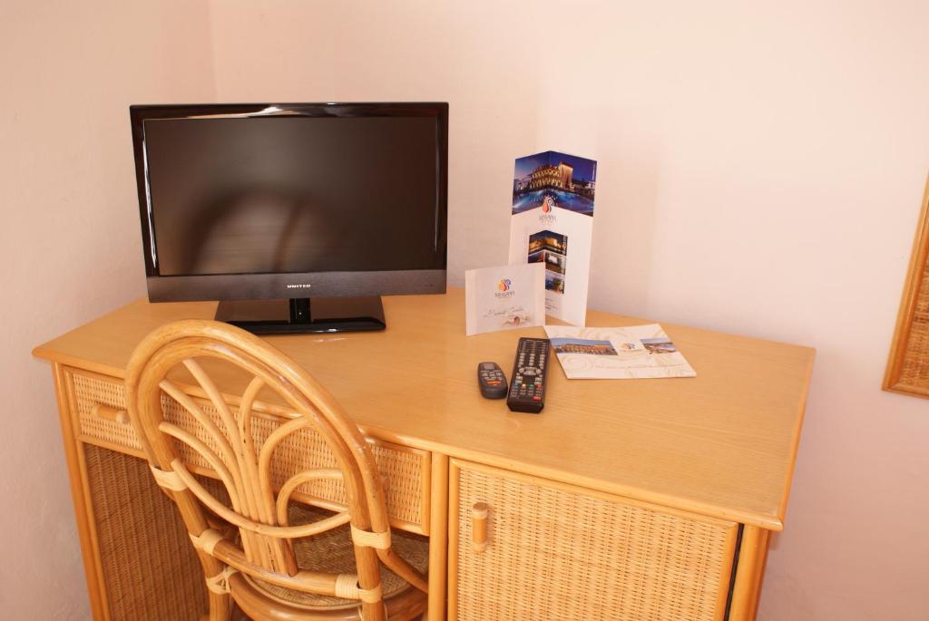 TV a/nebo společenská místnost v ubytování Messapia Hotel & Resort