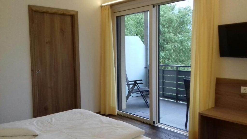 Postel nebo postele na pokoji v ubytování Garni Raffein
