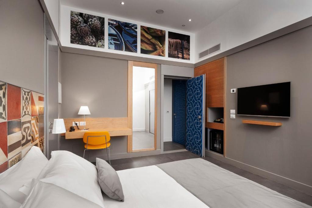 TV a/nebo společenská místnost v ubytování Hotel Medinblu