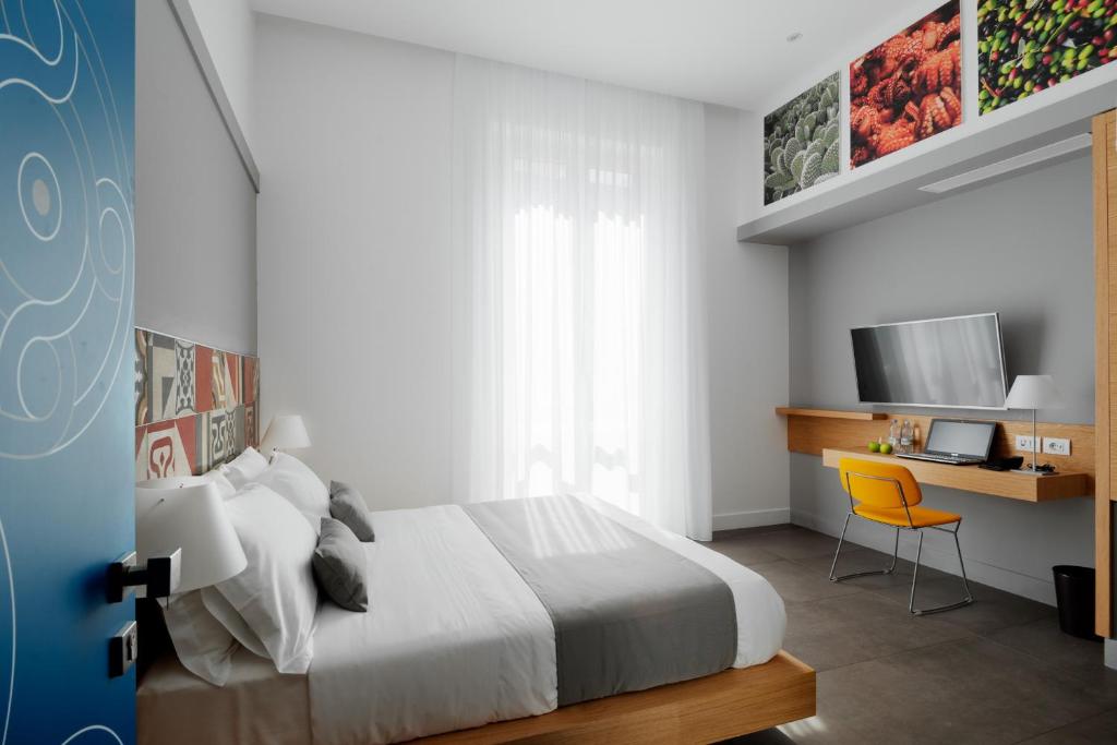 Postel nebo postele na pokoji v ubytování Hotel Medinblu