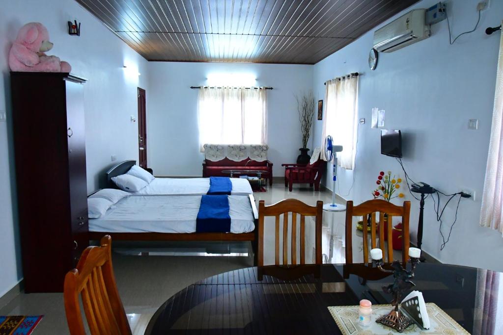 Postel nebo postele na pokoji v ubytování Royal Beach Abode