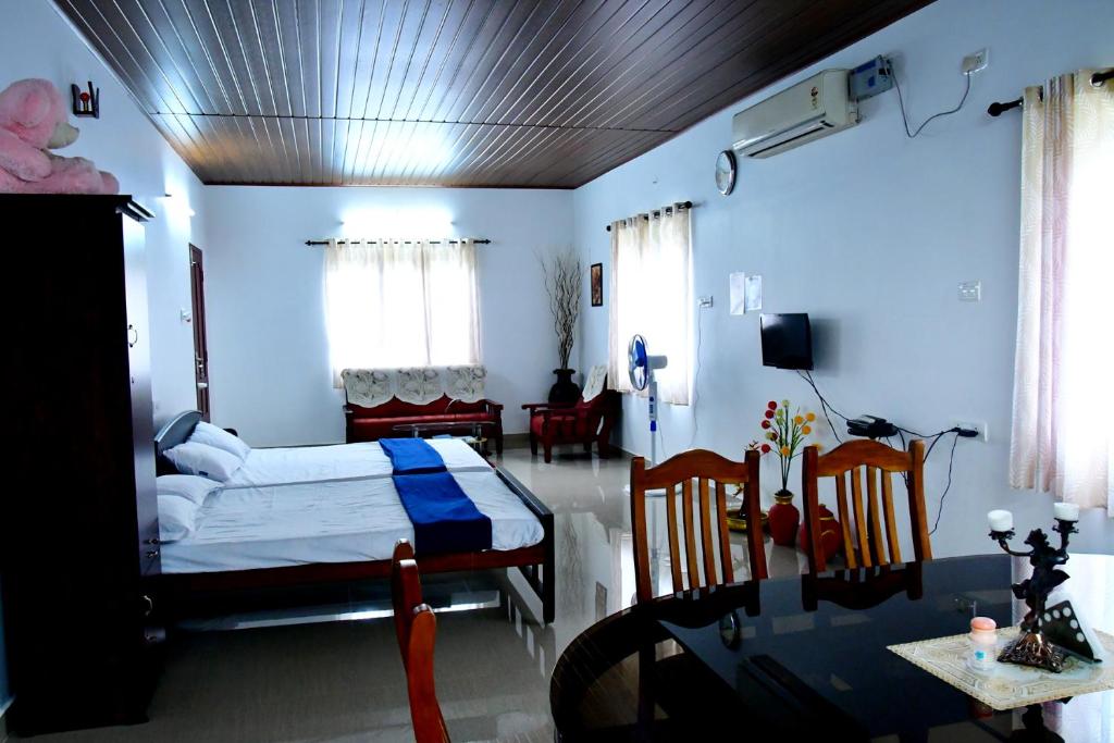 Postel nebo postele na pokoji v ubytování Royal Beach Abode
