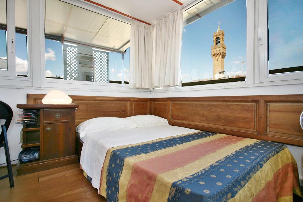 Posteľ alebo postele v izbe v ubytovaní Torre Lambertesca