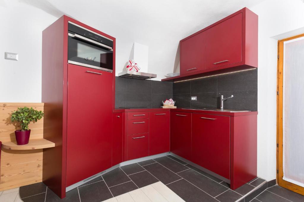 Kuchyň nebo kuchyňský kout v ubytování Residenza Al Cadin