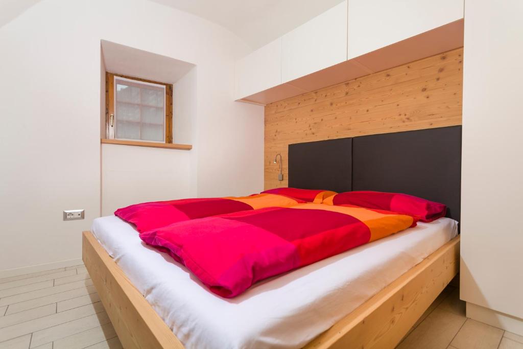 Postel nebo postele na pokoji v ubytování Residenza Al Cadin