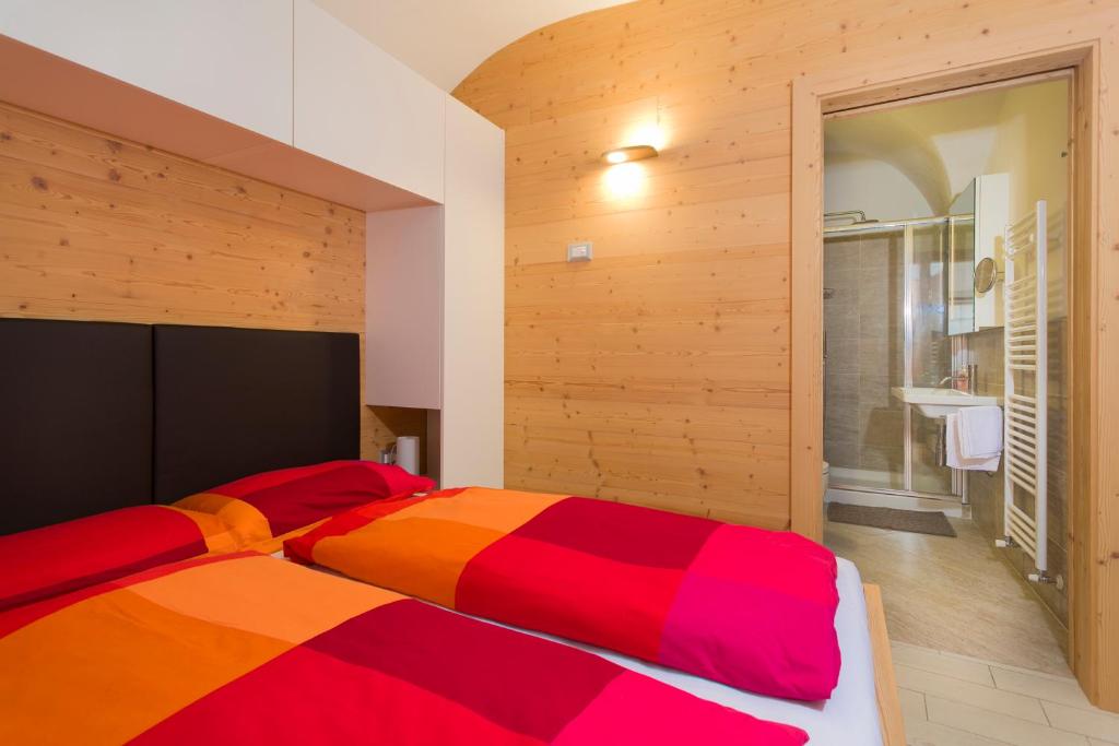 Postel nebo postele na pokoji v ubytování Residenza Al Cadin