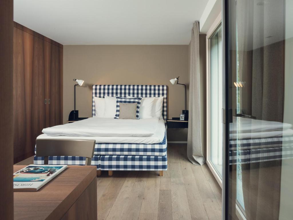 Voodi või voodid majutusasutuse OVERLOOK Lodge by CERVO Zermatt toas