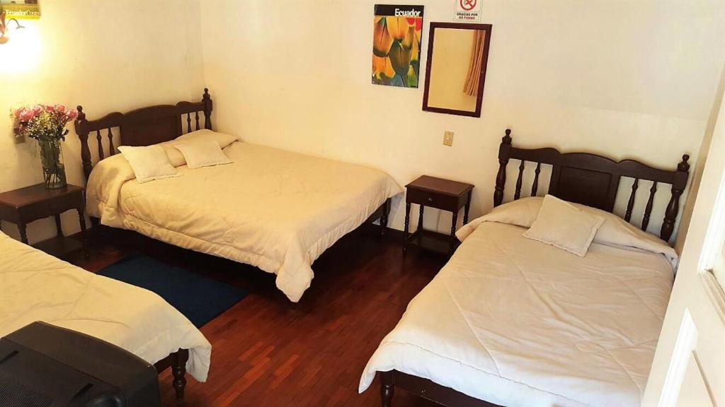 Postel nebo postele na pokoji v ubytování Hotel Europa
