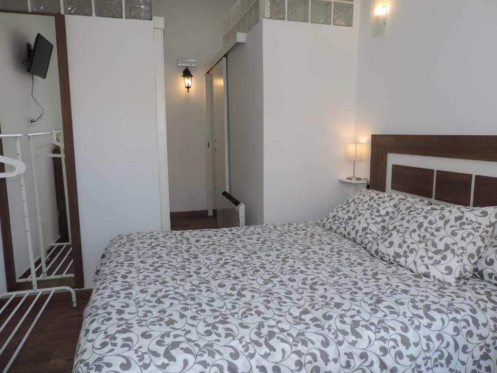 Postel nebo postele na pokoji v ubytování Casa las tres Conchas (2)
