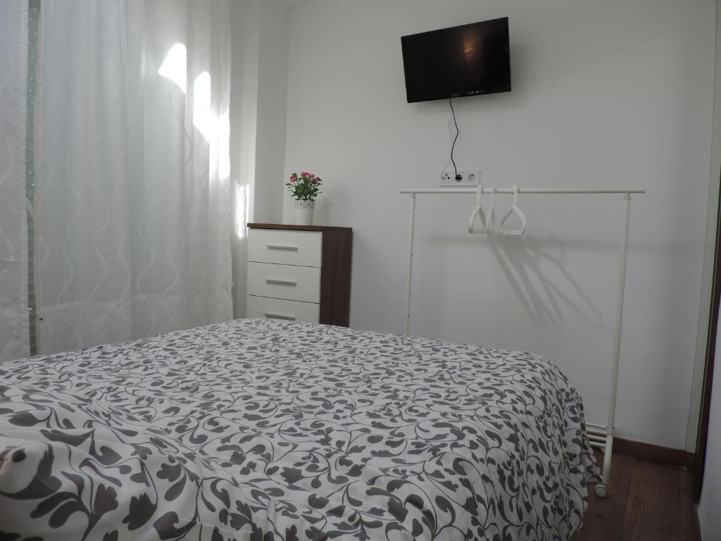 Postel nebo postele na pokoji v ubytování Casa las tres Conchas (2)
