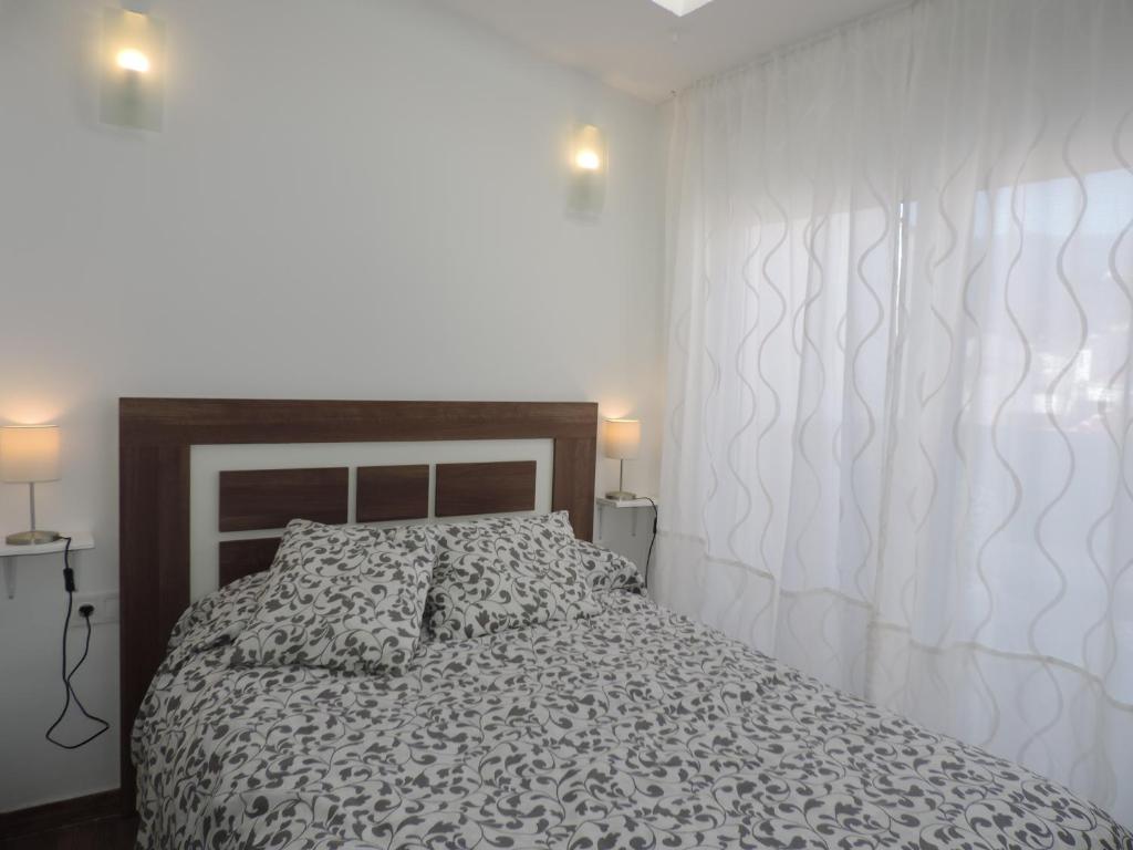 Postel nebo postele na pokoji v ubytování Casa las tres Conchas (2)