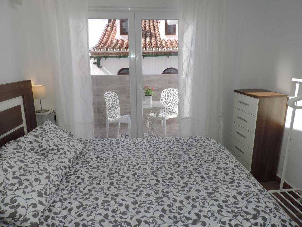 Postel nebo postele na pokoji v ubytování Casa las tres Conchas (2)