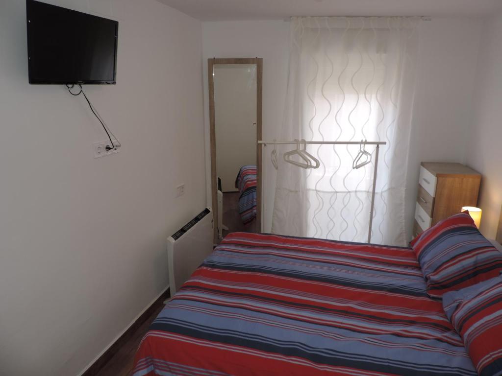 Postel nebo postele na pokoji v ubytování Casa las tres Conchas (2)