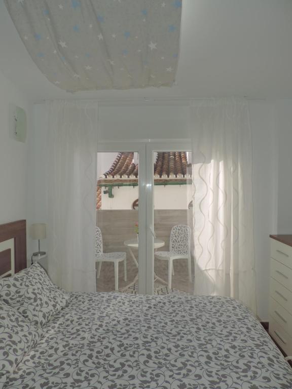 Postel nebo postele na pokoji v ubytování Casa las tres Conchas (2)