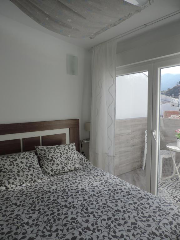 Postel nebo postele na pokoji v ubytování Casa las tres Conchas (2)