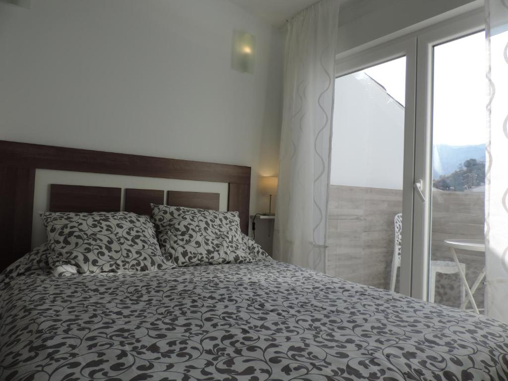 Postel nebo postele na pokoji v ubytování Casa las tres Conchas (2)