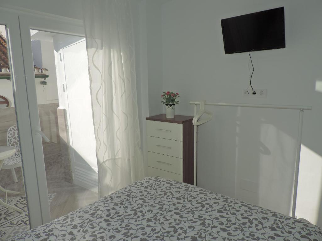 TV a/nebo společenská místnost v ubytování Casa las tres Conchas (2)