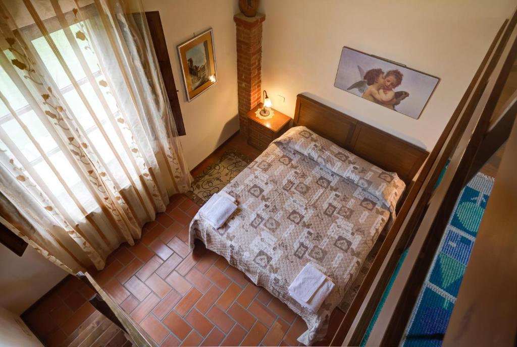A bed or beds in a room at Agriturismo San Francesco