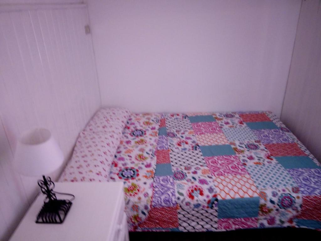 A bed or beds in a room at Apartamentos La Concepción