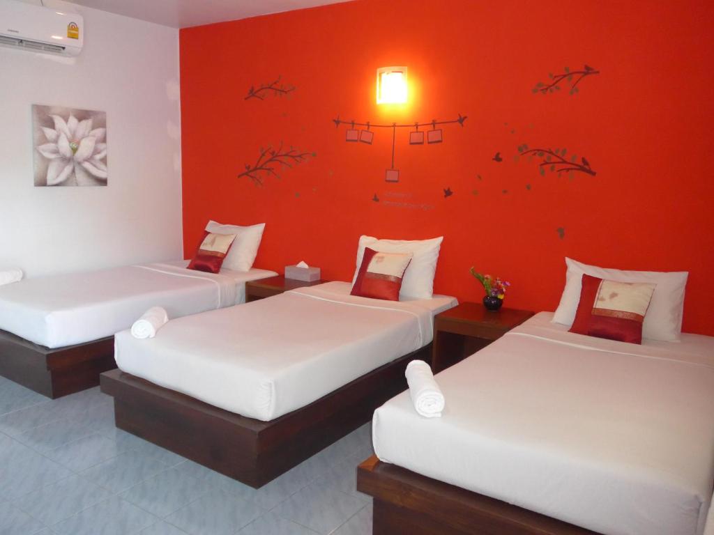Postel nebo postele na pokoji v ubytování Forum House Hotel Krabi