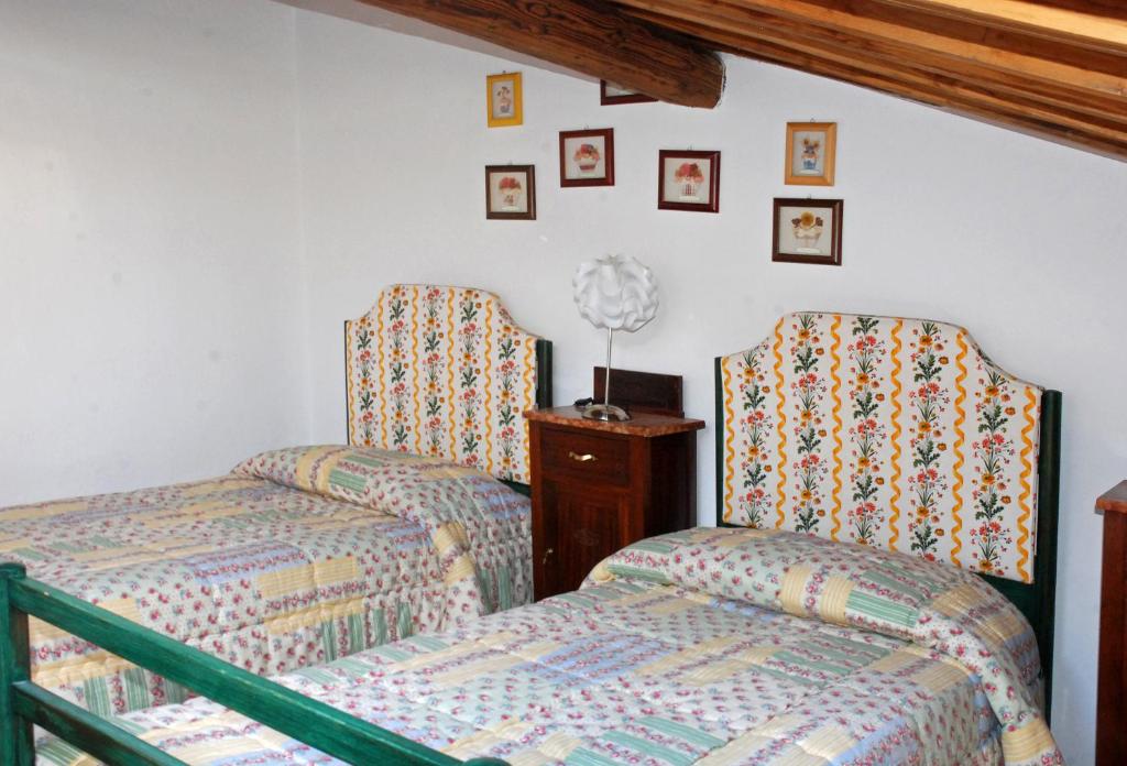 Postel nebo postele na pokoji v ubytování Agriturismo Olmi Grossi