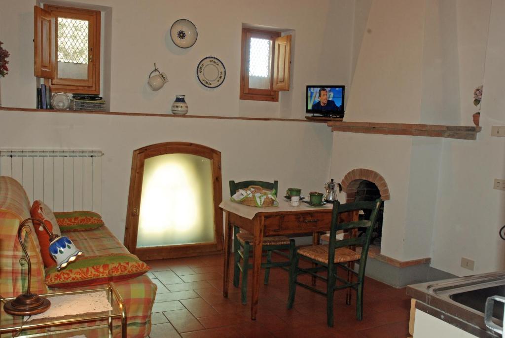 TV a/nebo společenská místnost v ubytování Agriturismo Olmi Grossi