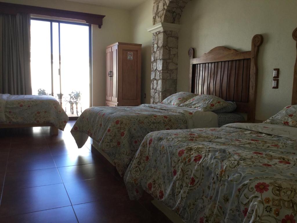 Postel nebo postele na pokoji v ubytování Hotel Mariazel