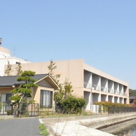 a large building with a street in front of it at Amanohashidateso in Miyazu