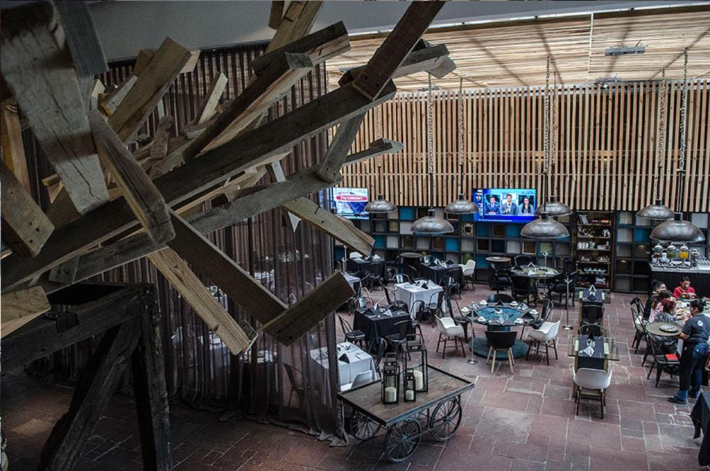 TV a/nebo společenská místnost v ubytování NEhotel Nueva Estancia