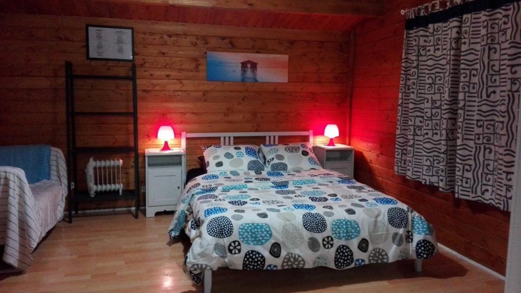 Posteľ alebo postele v izbe v ubytovaní Cabañas Volcán Capellania
