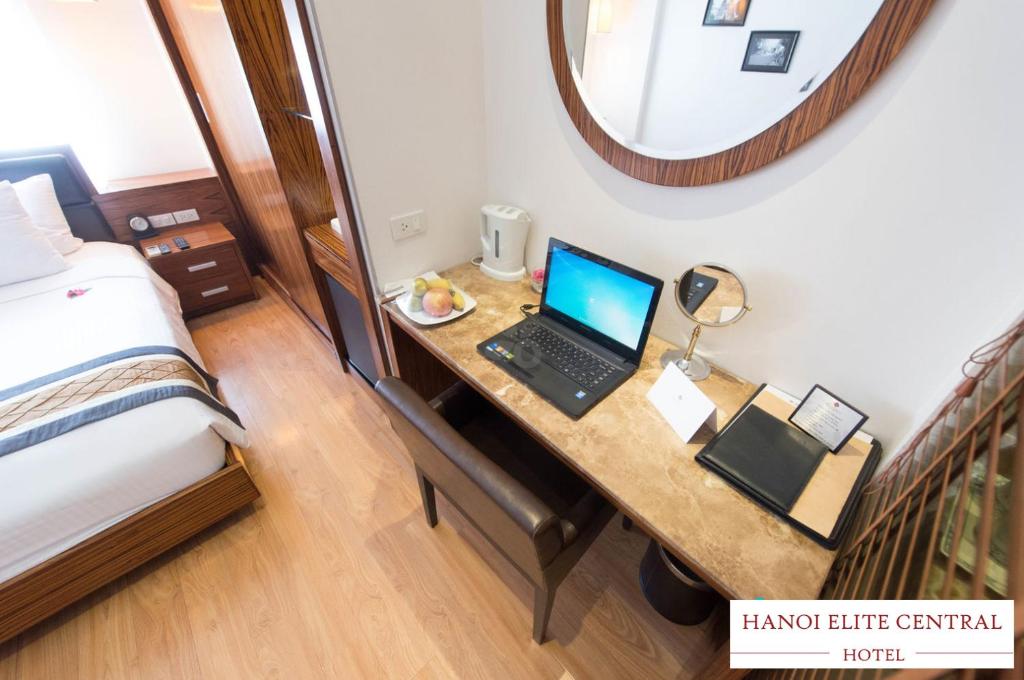 Postel nebo postele na pokoji v ubytování Elite Central Hotel Hanoi