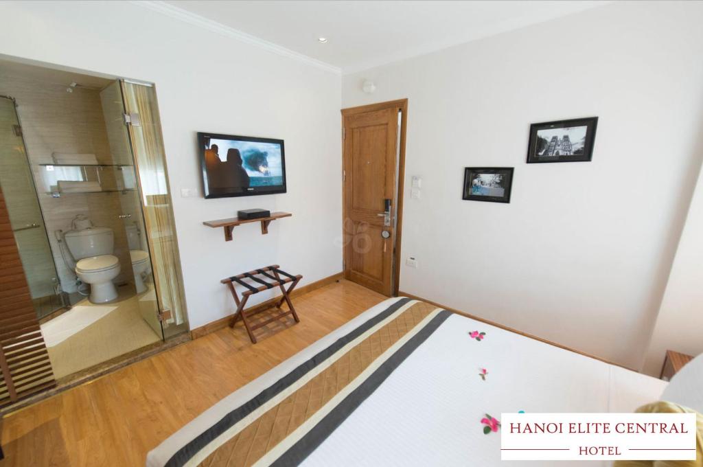Postel nebo postele na pokoji v ubytování Elite Central Hotel Hanoi