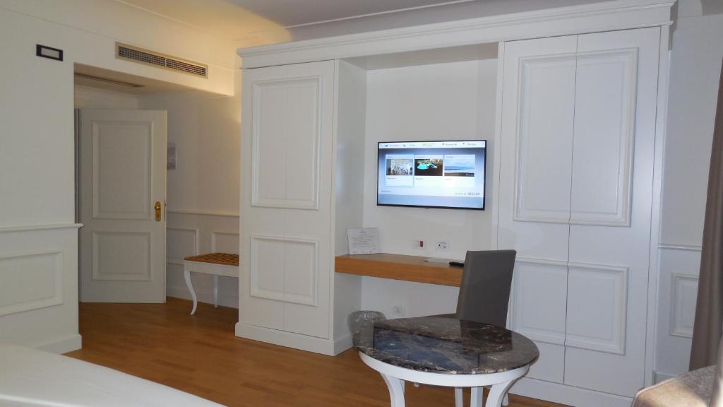 TV a/nebo společenská místnost v ubytování Hotel Marechiaro