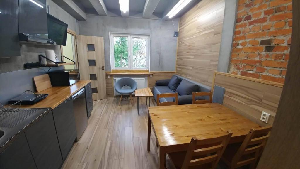 Kuchyň nebo kuchyňský kout v ubytování NavyBlue Apartments