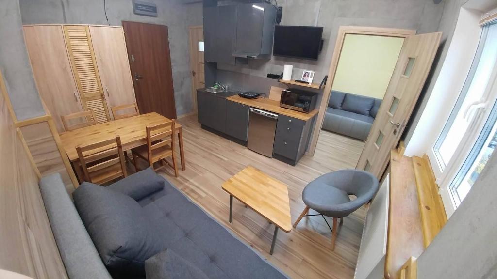 Kuchyň nebo kuchyňský kout v ubytování NavyBlue Apartments